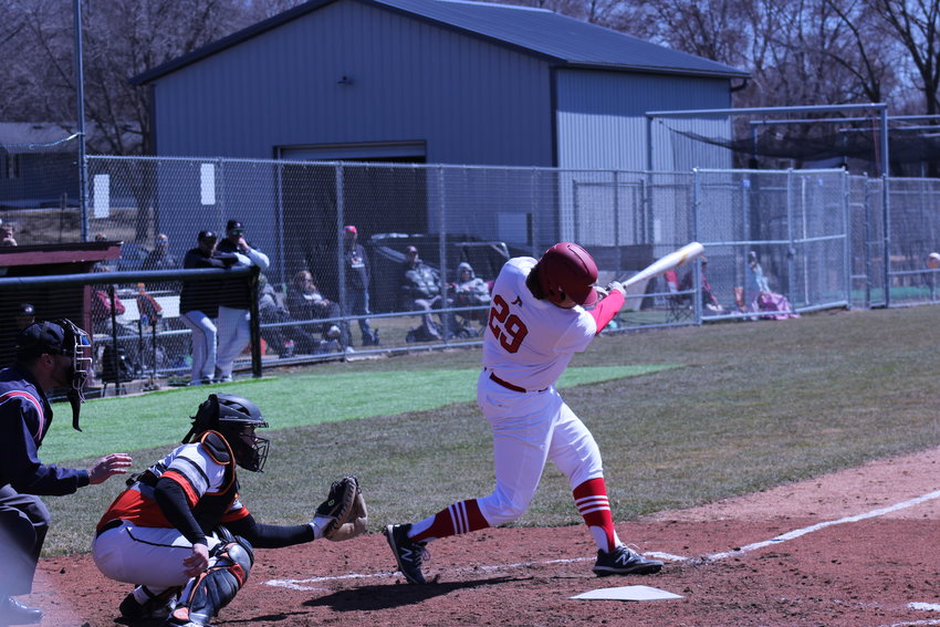 Then-junior Dyrden Seeley rips a single down the left field line during one of Prescott&rsquo;s home games last year. Seeley returns for his senior campaign this spring and is expected to be one of Prescott&rsquo;s most important players.