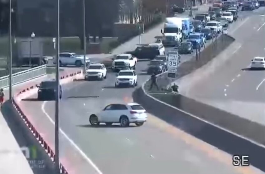 Here, Hastings police have traffic stopped to force the car thief to turn around and head out of Hastings. Officers were not able to capture him at this point. The driver evaded capture for nearly another hour, being caught by Ramsey County Sheriff&rsquo;s Office in St. Paul. Photo courtesy of MNDoT Traffic Cam