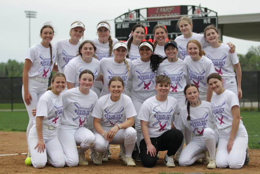 The River Falls High School softball team was all smiles after defeating Prescott 7-0 in the annual rivalry game on Saturday, May 13. The Wildcats are Cardinals made the rivalry game a Strikeout Cancer fundraiser, which raised $1,502 for the American Cancer Society.