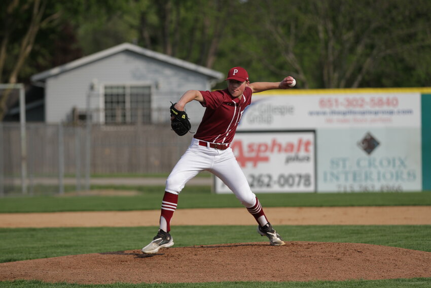 Prescott junior pitcher Cullen Huppert delivers a strike during a game earlier this season. Huppert and the Cardinals got knocked out of the Division 2 playoffs via a 5-3 defeat against Ellsworth on Thursday evening.