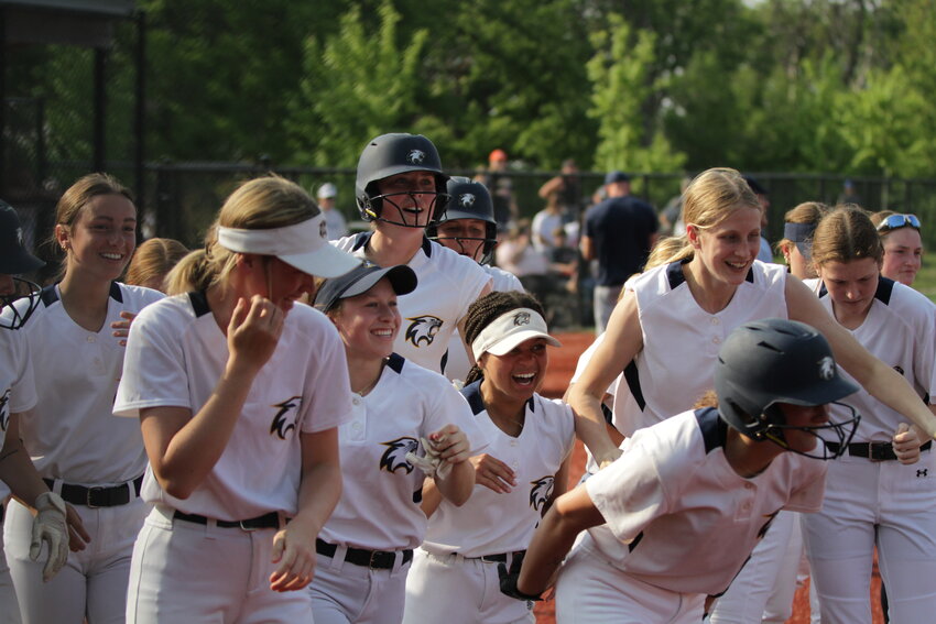 The River Falls High School softball team was all smiles as they returned to the dugout after running out to congratulate junior Jordan Torrez after she hit a two-run home run in the top of the third inning of the Division 1 regional semifinal game against Hudson on Tuesday, May 23.