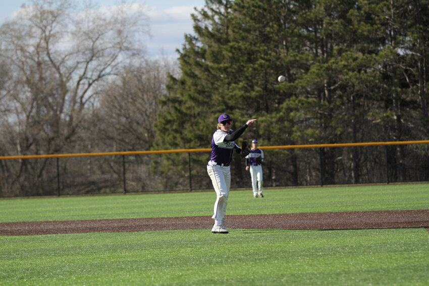 Ellsworth senior Anthony Madsen fields a ground ball and throws a laser across the infield to retire one of Baldwin-Woodville&rsquo;s batters earlier this year. Madsen was one of Ellsworth&rsquo;s most impactful players throughout the last three seasons and helped permanently change the Panthers&rsquo; culture.