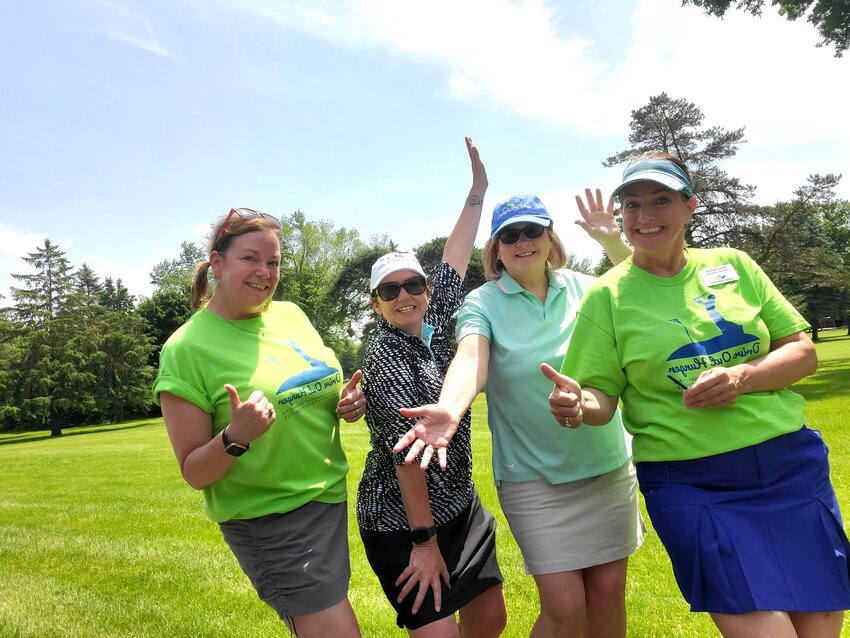 Drive Out Hunger is meant to be a fun way to help others as demonstrated by this foursome. From left, Katy Lindberg, Pam Offler, Debbie Grim and Amy Sutton.