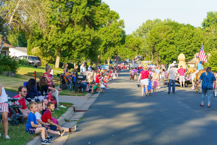 Residents line 15th Street for the first Hastings Fourth of July Parade last year. This year, the route was extended to include a turn onto Westview Drive from 15th Street to Hastings Golf Club.