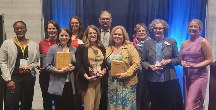 Pictured in Madison at the Wisconsin Association of Local Health Departments and Boards annual awards are (from left): Dr. Lola Awoyinka, Joy Tapper, Courtney Geiger, Chair Jon Aubart, Eileen Eckardt, Public Health Director AZ Snyder, Annette Siebold, Linda Conlon, Dr. Susan Zahner and Kirsten Lezama.