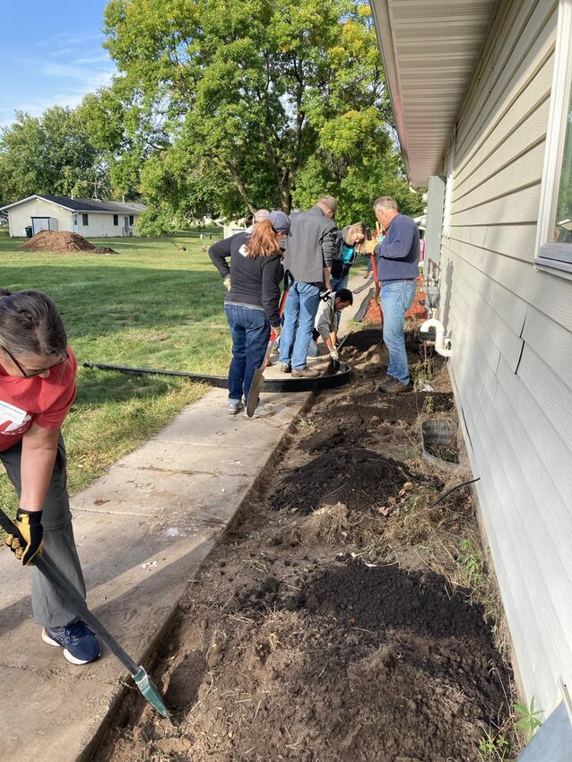 Landscaping work being done as part of Rock the Block&rsquo;s River Falls projects during 2019.