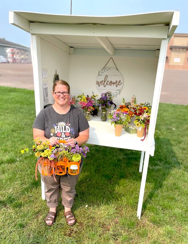 Sarah Swope, lifelong Stanley-Boyd area resident and owner of Junie Bee&rsquo;s Flower Farm, says that she has grown all types of flowers, from peonies and lilies to zinnias and sunflowers, because she loves them all.