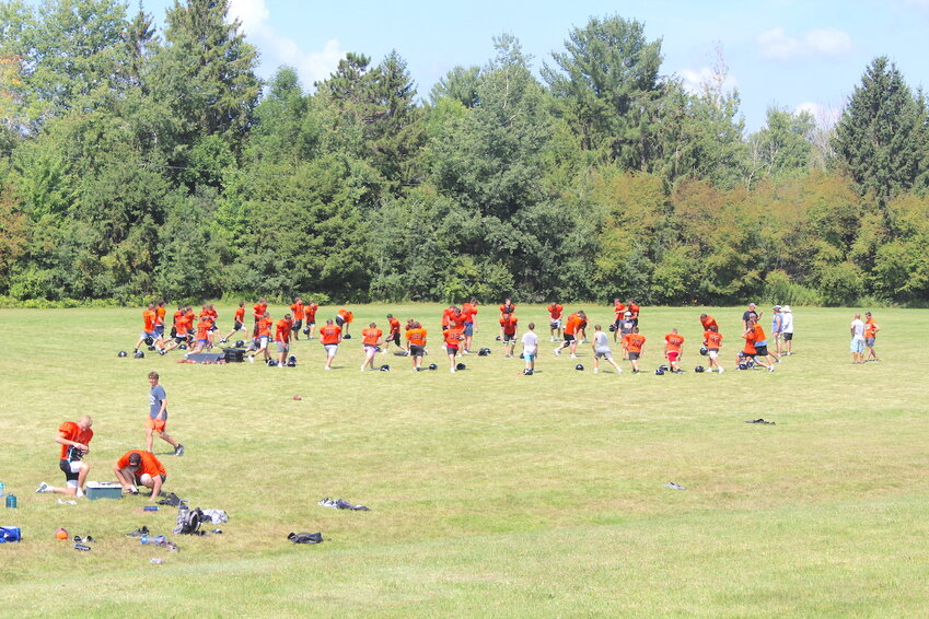 The Stanley-Boyd Orioles take part in exercises on the practice field Thursday, a scrimmage scheduled for Friday August 11 at 10 am in Oriole Park.