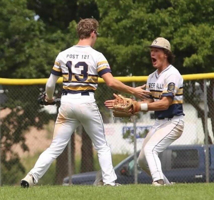 Eli Condon (right) congratulates center fielder Bryce Bevens after Bevens threw out a Holmen runner at homeplate for the final out to secure the 4-3 quarterfinal win at the American Legion State Tournament in Ashwaubenon, Wis., last week.