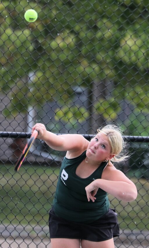 Park&rsquo;s Liv Evans serves at No. 1 doubles against a Harding opponent Monday afternoon.
