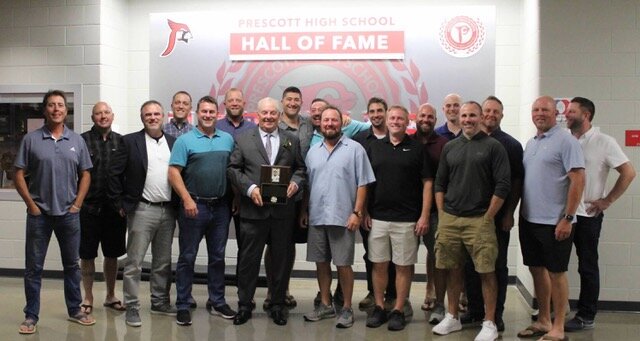 Prescott Hall of Fame inductee and former head baseball coach Steve Block with many of the players he coached. The induction ceremony saw its largest turnout ever this year.