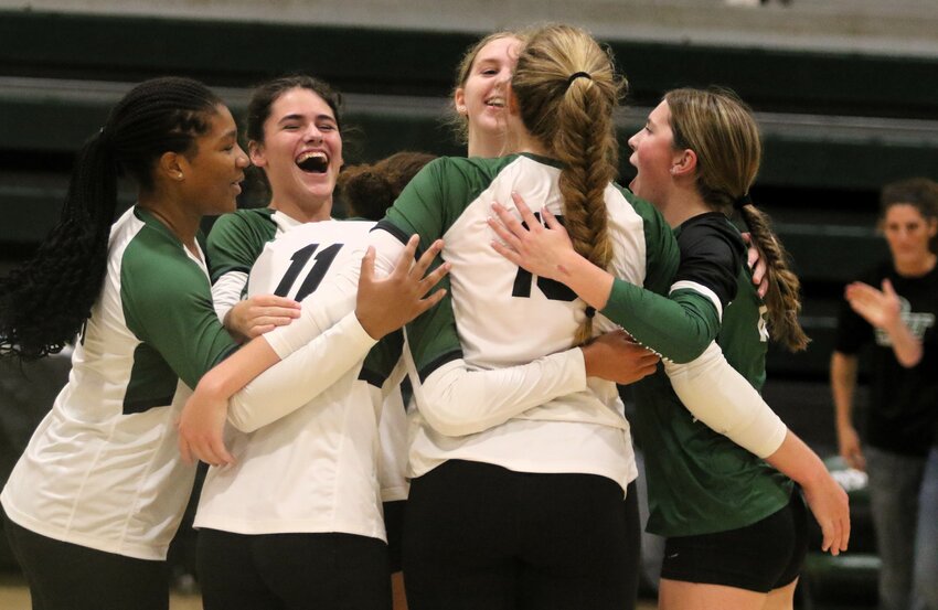 The Wolfpack celebrate a hard-fought win over a good Roseville team Thursday.