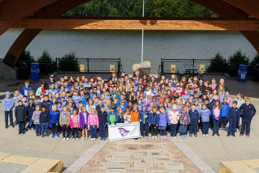 All of the students present for the walk gathered in front of the Rotary Pavilion for a group photo. This is the group that helped raise over $40,000 for their school.