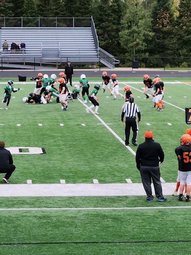 The Stanley-Boyd 7th grade offense pushed through for the tackle against Regis.