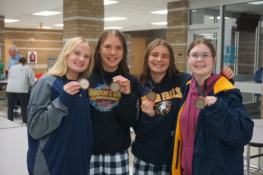 River Falls had four swimmers medal and earn all-conference  honors at their last meet of the year in Eau Claire on Saturday. From left: Annie Ottem, Sydney Thompson, Elise Gulick and Mickey Baar.