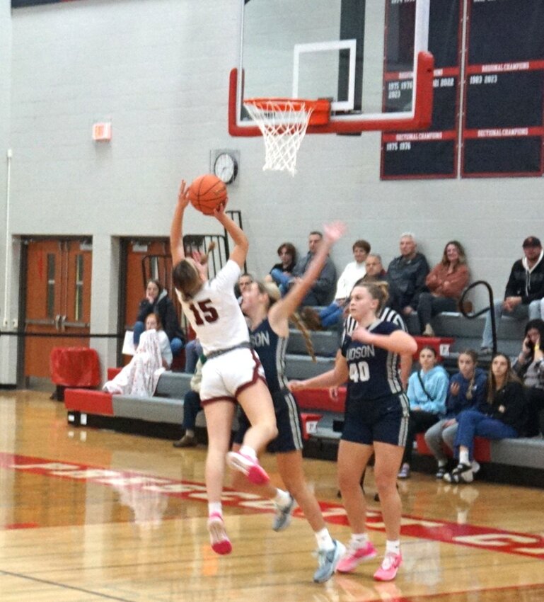 Leah French pushing the basket for a layup against the Hudson Raiders on Friday night.