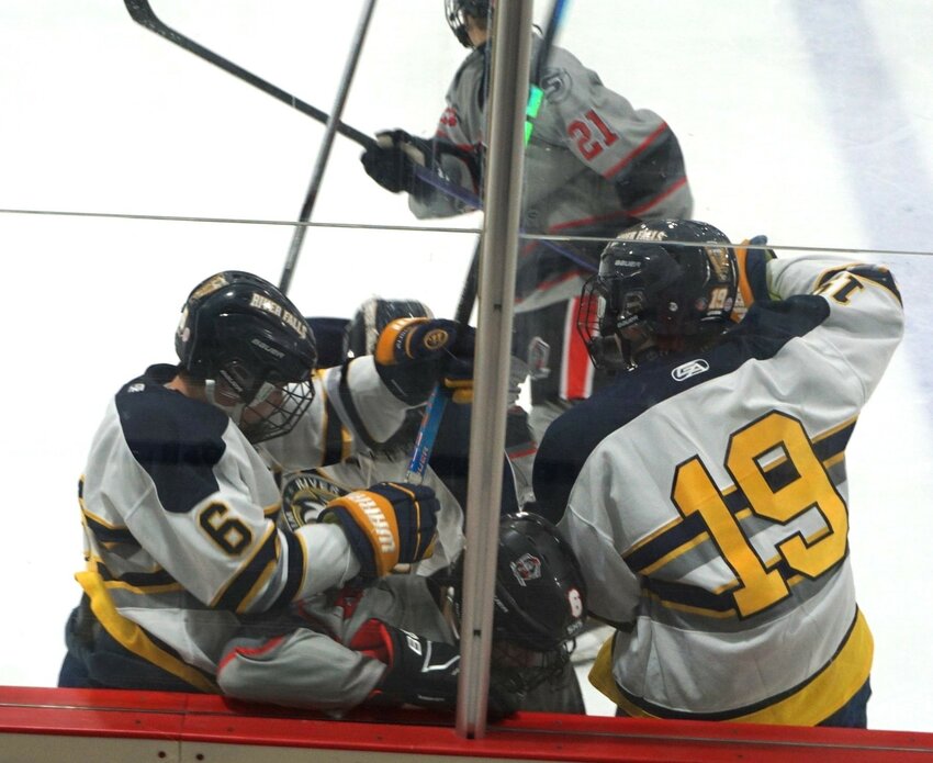Riley Usgaard and Jake Lien playing physical hockey in a scrimmage against the Somerset Spartans on Thursday night.