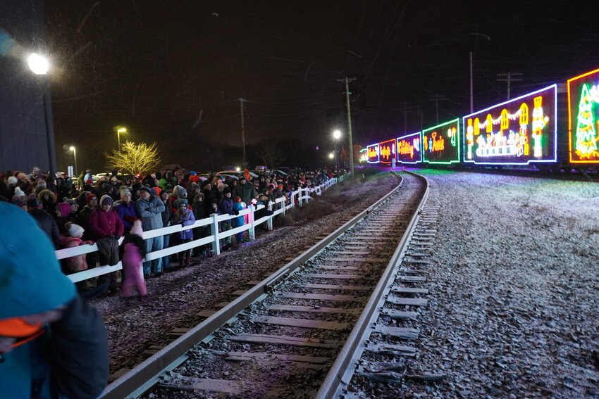 The shoulder-to-shoulder crowd stretched a block on either side of Second Street and deep to the west of the tracks to see the CPKC Holiday Train Saturday.