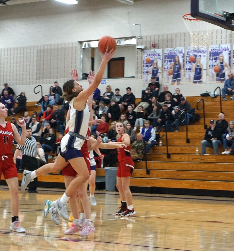 Molly Janke pushes the basket and goes up for the layup in Ellsworth on Friday, Dec. 8.