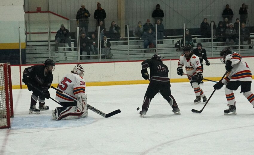 Fusion battle in front of the net on defense in Saturday's 4-1 win over the Central Wisconsin Storm in River Falls.