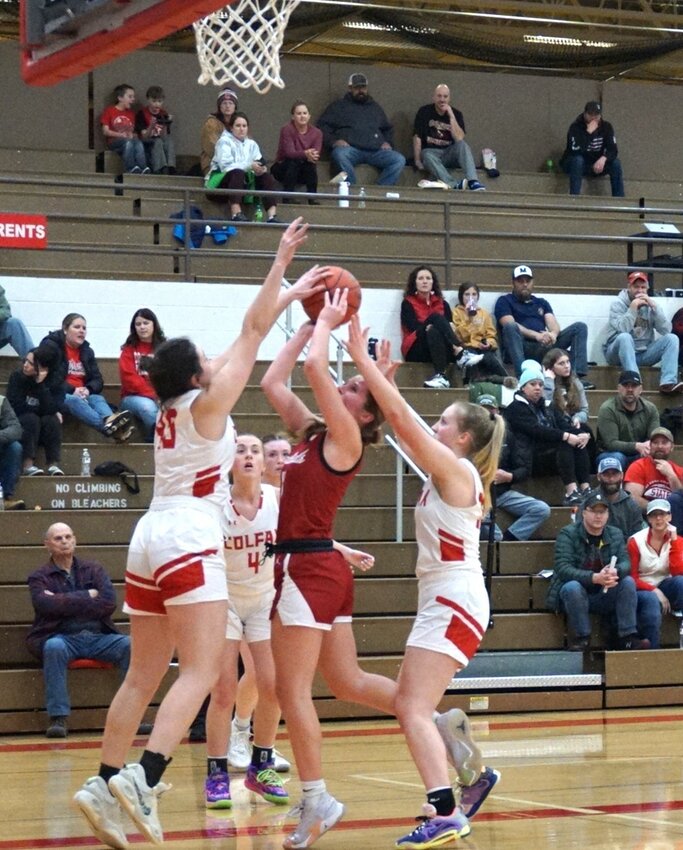 Nothing came easily for the Spring Valley Cardinals in Thursday night's loss. Mara Ducklow dealing with tight coverage on a heavily contested layup attempt.