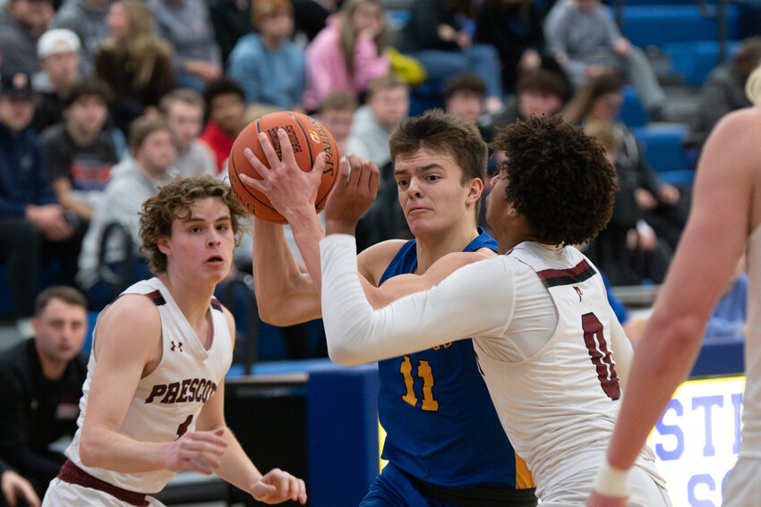 Hastings senior guard Owen Bernatz leads the team in scoring in early-season play, averaging 20.3 points per game. He worked his way through Prescott defenders Thursday in the Raider Holiday Tournament.