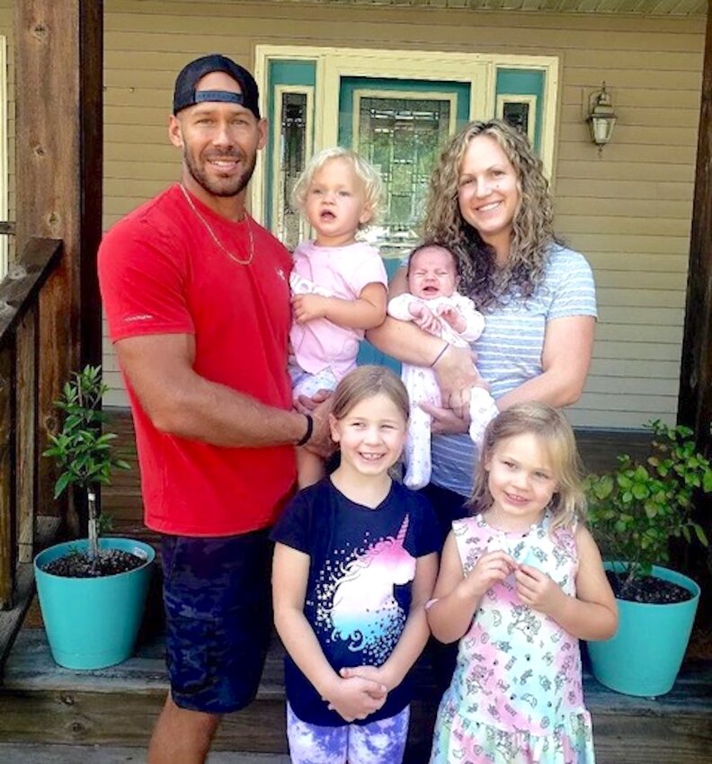 High School Teacher Robert Allen (back left) and his wife, Amber (right), are busy working and raising daughters Avery, Ayla, Alayna, and Arley.