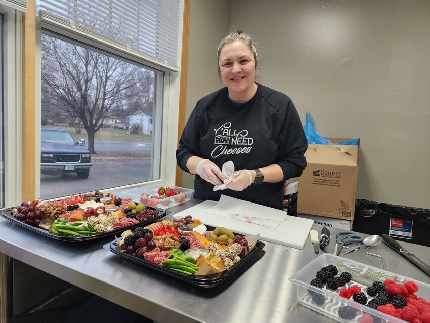 River Falls business owner and resident Brianne Rehak &ldquo;That Girl Brie&rdquo; is amazed by how her charcuterie business has exploded since its founding. She works on a board in her new storefront, located at 123 W. Cascade Ave., River Falls.