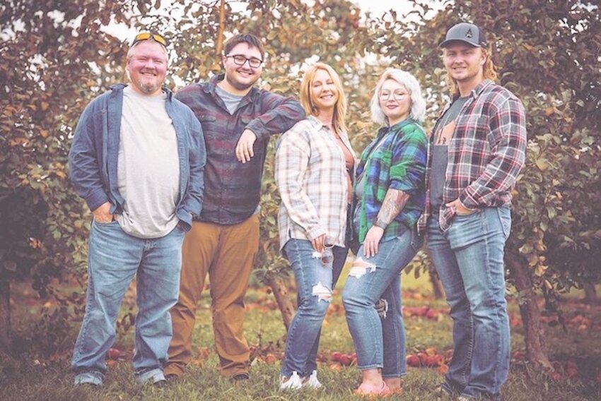 Through Denzine Surveying, the Denzine family has provided the Stanley community and surrounding areas with trusted land surveying since 2008. From left to right are Rick, Sam, Jenny, Abigail, and Gabe Denzine.