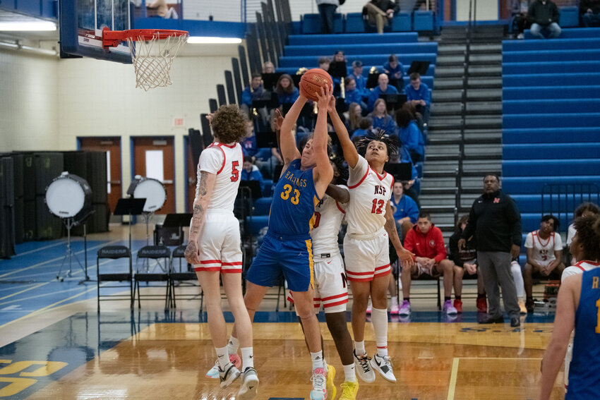 Kellen Nuytten came down with a rebound in a home game last Tuesday against North St. Paul. The senior center had a great week, scoring 46 points over two games.