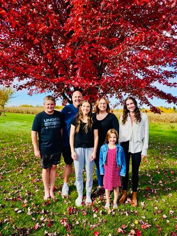 Melissa Lew and her family have enjoyed being closer to family while living in Stanley for the past seven years.  Shown above (back row, left to right) are Aaron, Dean, Melissa, Kelly (front row) Amanda and Bailey.