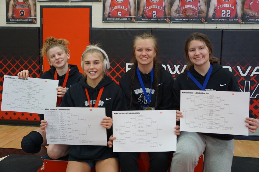 Hastings girls wrestling team members headed to the MSHSL State Wrestling Tournament at the Xcel Energy Center Feb. 29-March 2 are (from left) senior Ivy Brandenburg, junior Annabel Norquist, senior Skylar Little Soldier and junior Amelia Miller. Little Soldier in seeking her third state title. Brandenburg and and Norquist will be competing at state for the second time.