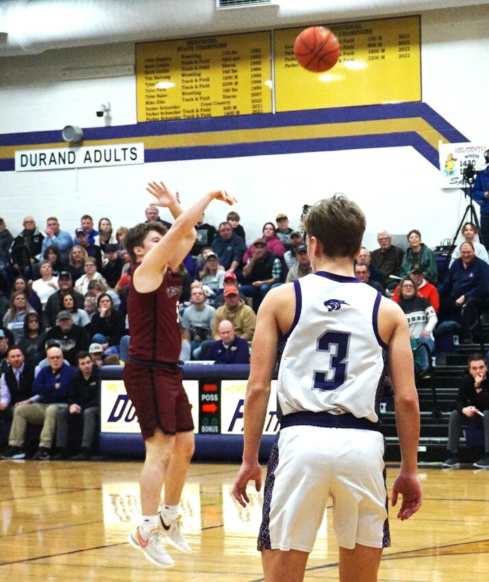 Trevor Forster with a wide-open shot for three in the Cardinals&rsquo; loss to the Panthers in Durand on Friday night.