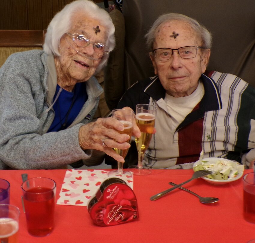 Valetta and William Schauls in a celebratory toast, in honor of spending Valentines Day together.