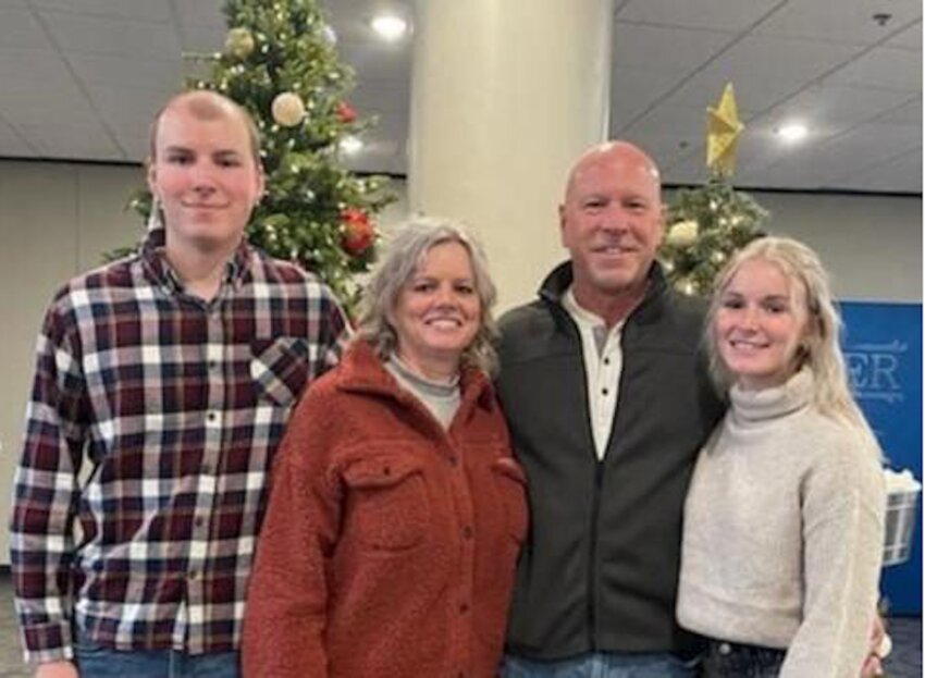 The Wayne Johnson family. From left to right
are Nate, MaryBeth, Wayne, and Lexi.