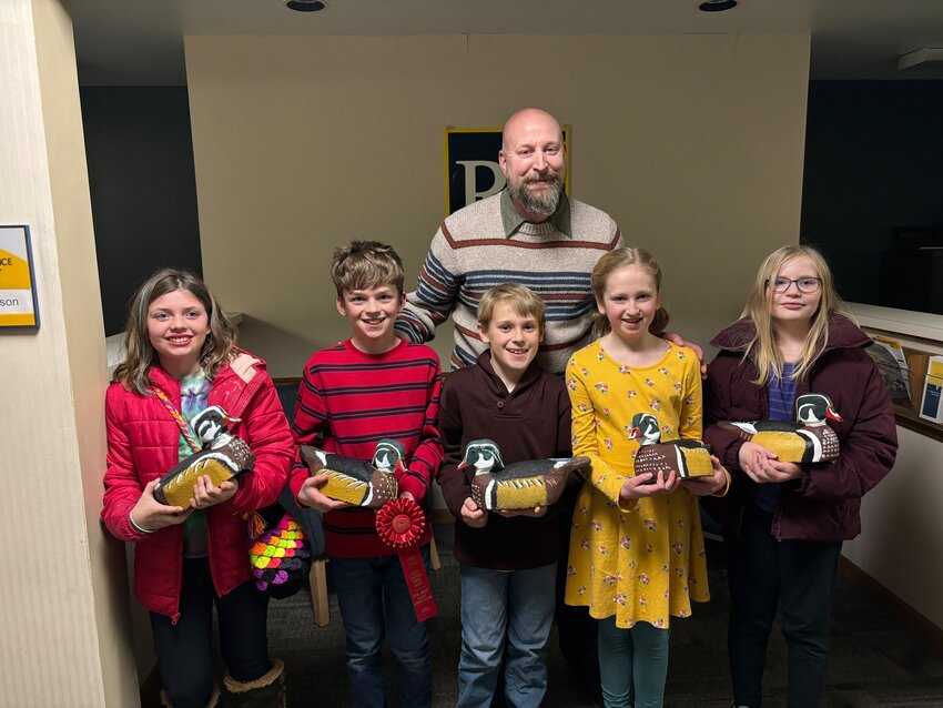 Steve Papp, leader of the Greenwood Carving Club, received a Wildcat Pride Award at the Feb. 19 River Falls School Board meeting. Several of the club members spoke about the club.