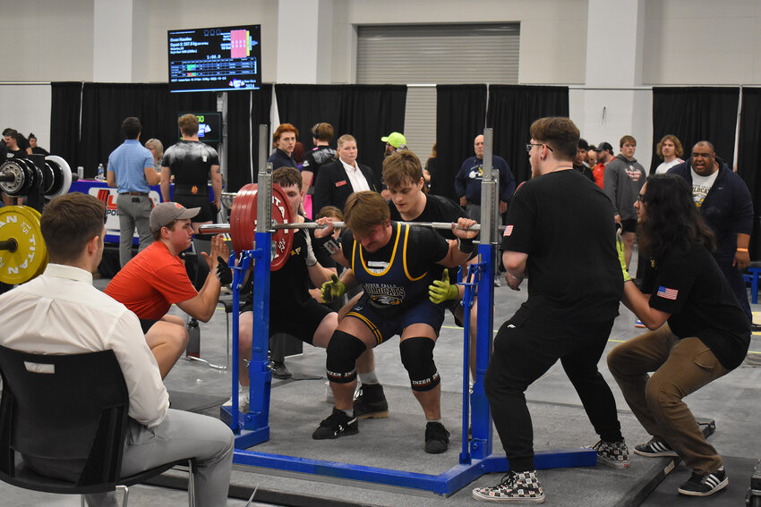 Colton Christensen competing in the state powerlifting competition in Appleton where he took third and qualified for nationals for the third year in a row.