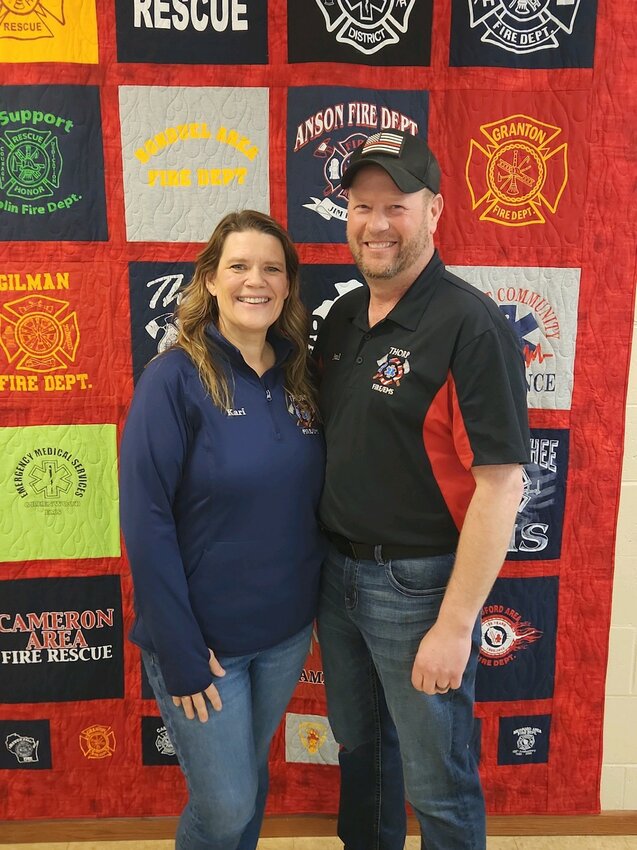 Thorp Fire Chief Paul Skibbie (right) stands with his wife, Kari after accepting the position of full time Thorp Fire Chief at the Tuesday night meeting on March 12th. A delicious cake from Sweet Memories in Thorp was shared to celebrate as Chief Skibbie was also celebrating his birthday that evening.