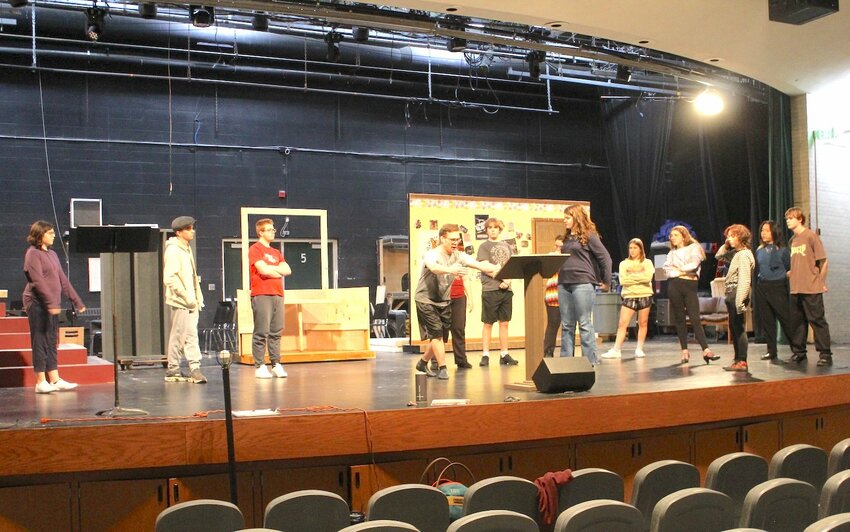 Cast members gather around as choreographer Lewis Youngren gives stage direction for &lsquo;The Prom,&rsquo; coming to Park High Theater April 19.