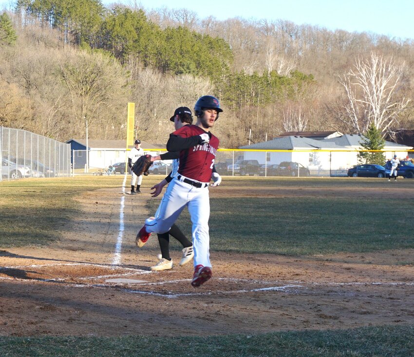 Will Biggs crossing the plate in the Cardinals&rsquo; 9-1 win over the Wolves in Spring Valley on Thursday.
