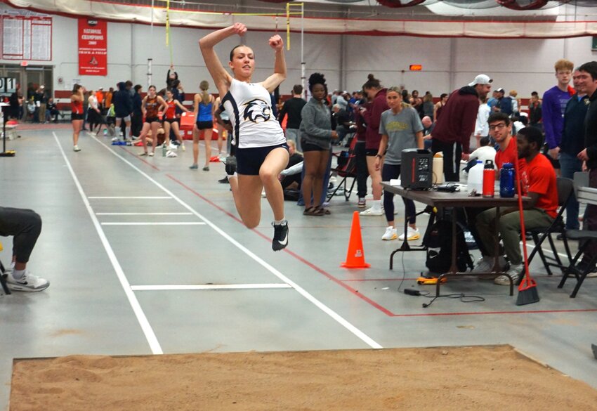 Brooke Dusek takes first place in the long jump event at the track and field invite at Hunt Arena last week in River Falls.