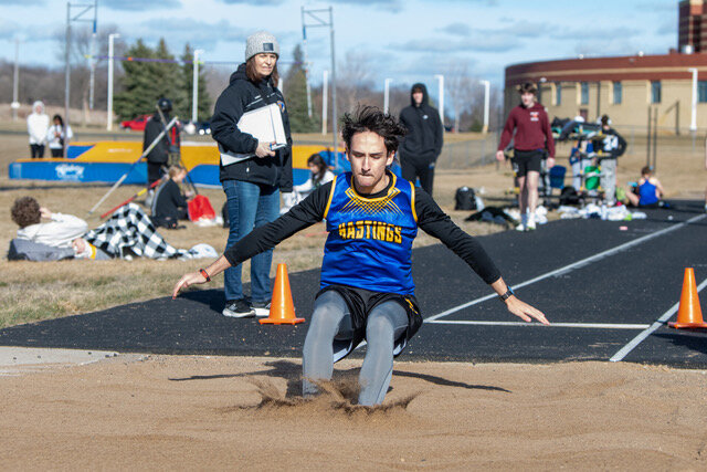 Aven Johnson hit the long jump pit at a meet hosted by the Raiders earlier this season.