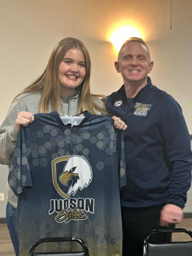 River Falls High School senior Payten Kusilek with Judson University Bowling Coach Vice Biondo. Kusilek signed her scholarship letter of intent this past weekend in Elgin, Ill.