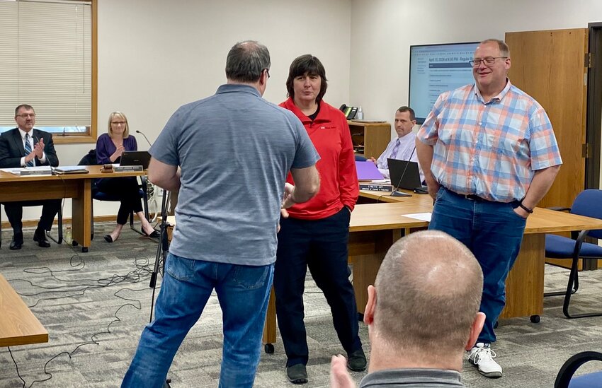 Outgoing school board members Cindy Holbrook and Bob Casey received Wildcat Pride awards for their years of service at the April 15 River Falls School Board meeting.