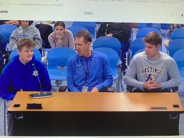 Activities Director Trent Hanson spotlighted the accomplishments of Triple A winner Noah Quigley (left) and Excel winner Lucas Faas (right).
