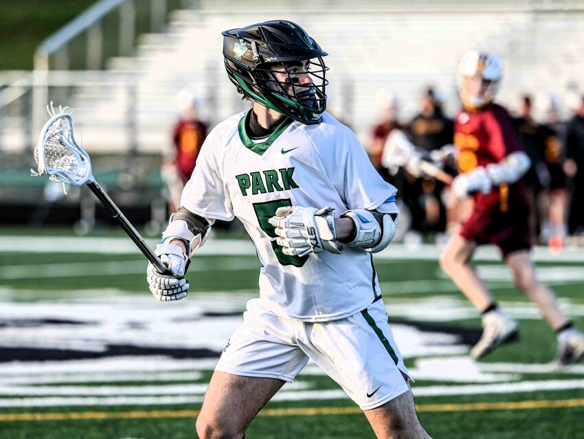 Park's Zachary Devaan had a big game against Forest Lake, scoring three goals in the Wolfpack's 12-8 win.