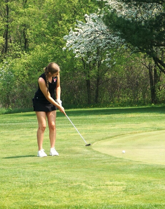 Spring Valley Cardinal Mara Ducklow putting off the fringe at Glen Hills Golf Course on Monday.