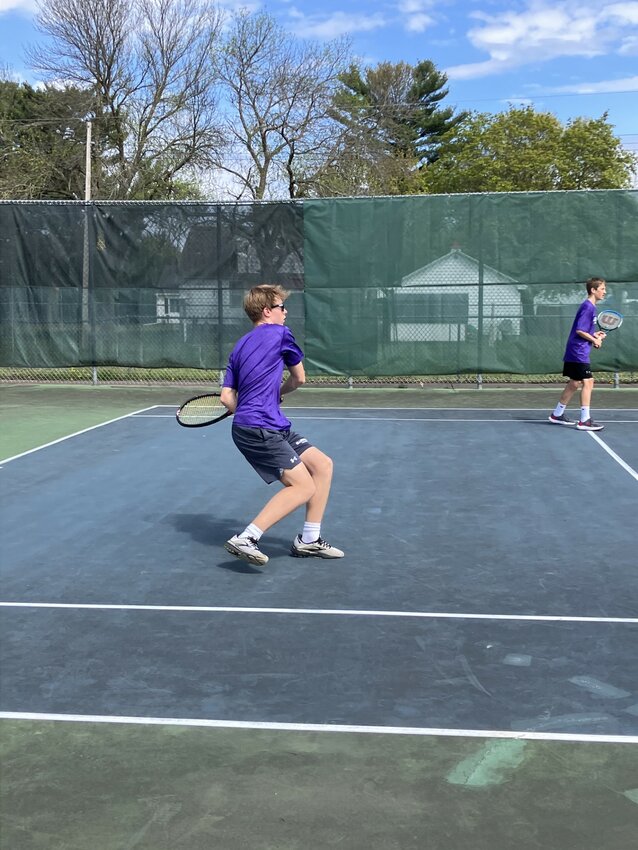 Thomas Helseth and Milan Johnson playing doubles for the Ellsworth Panthers.