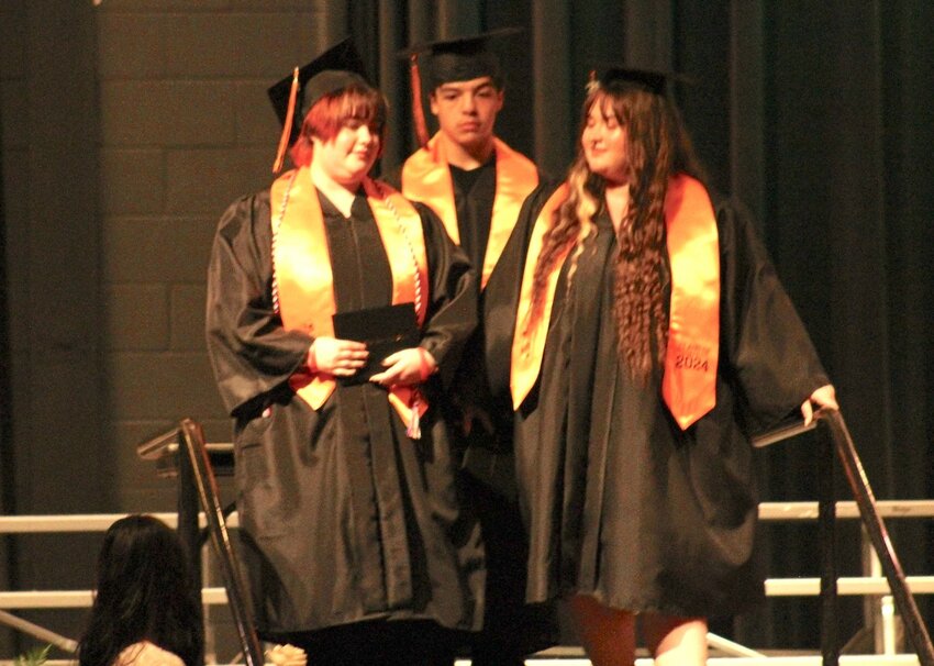 Moved inside after Thursday night forecasts predicted rain, graduation time Friday saw the   Stanley-Boyd Schools as the Stanley-Boyd Class of 2024 bid farewell to high school. Shown above are Alayna Gergely, Christian Ruiz, and Lindsay Hughson.