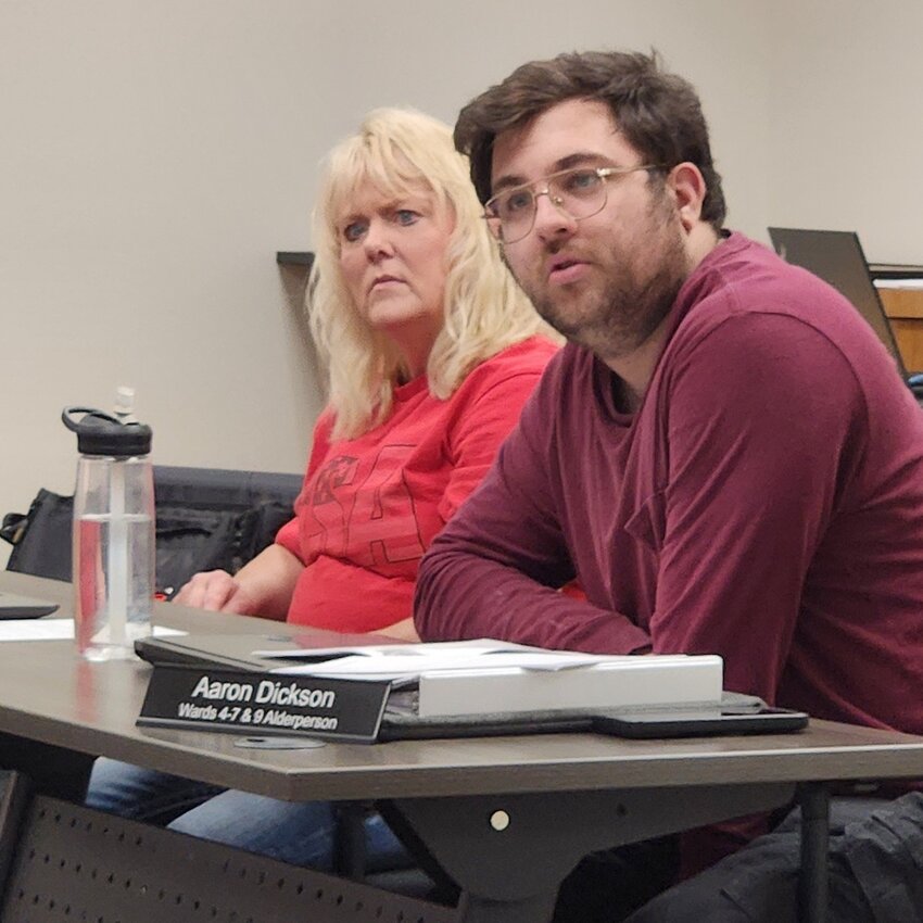 City Council members Laurie Foster (left) and Aaron Dickson listen as Alderperson Jason Meyers asked Fire Chief Korey Hagenson for clarification on the Fire Department